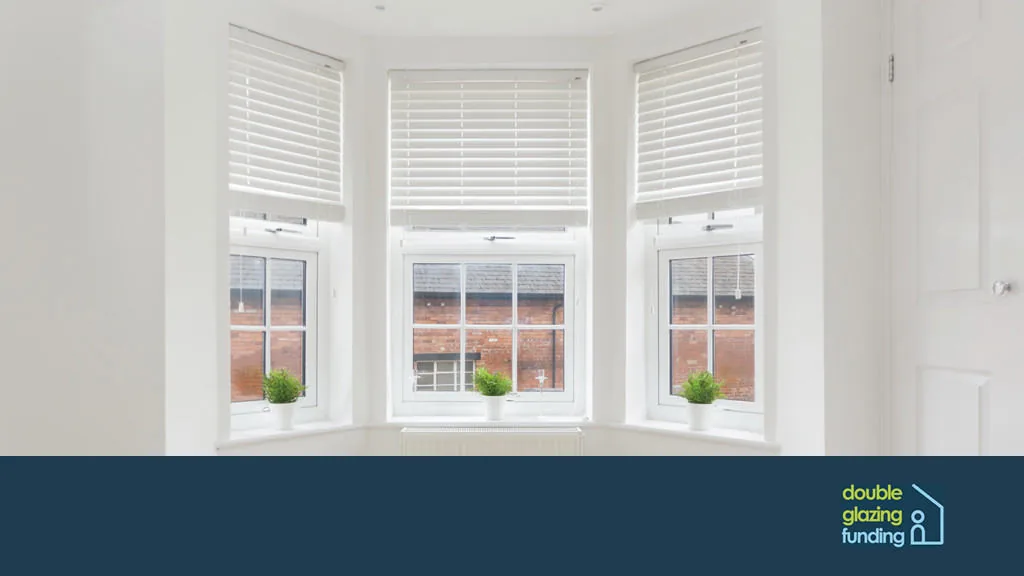 Vetted double glazing installers comparing quotes for a UK homeowner