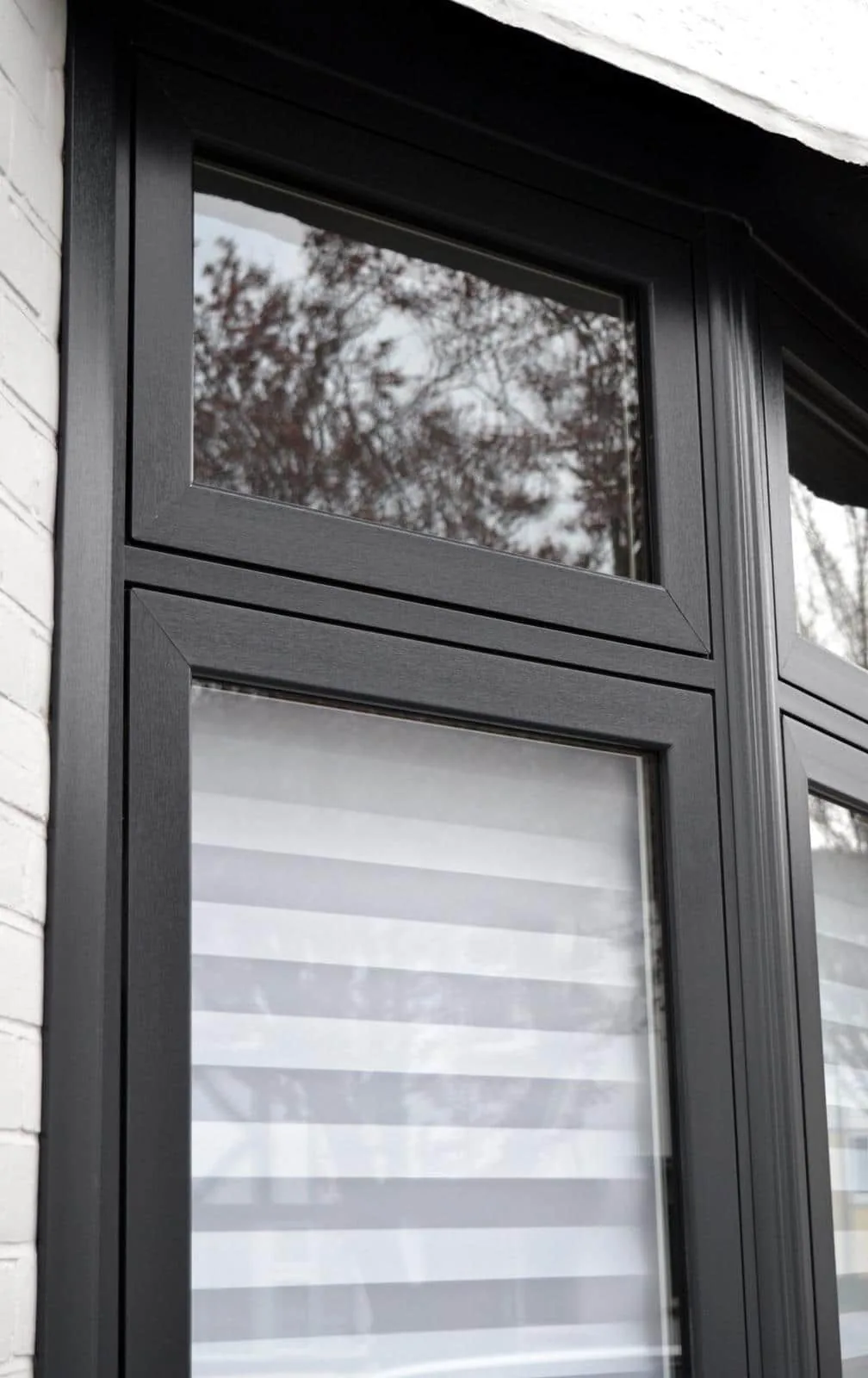 Close-up of modern black flush double glazed windows