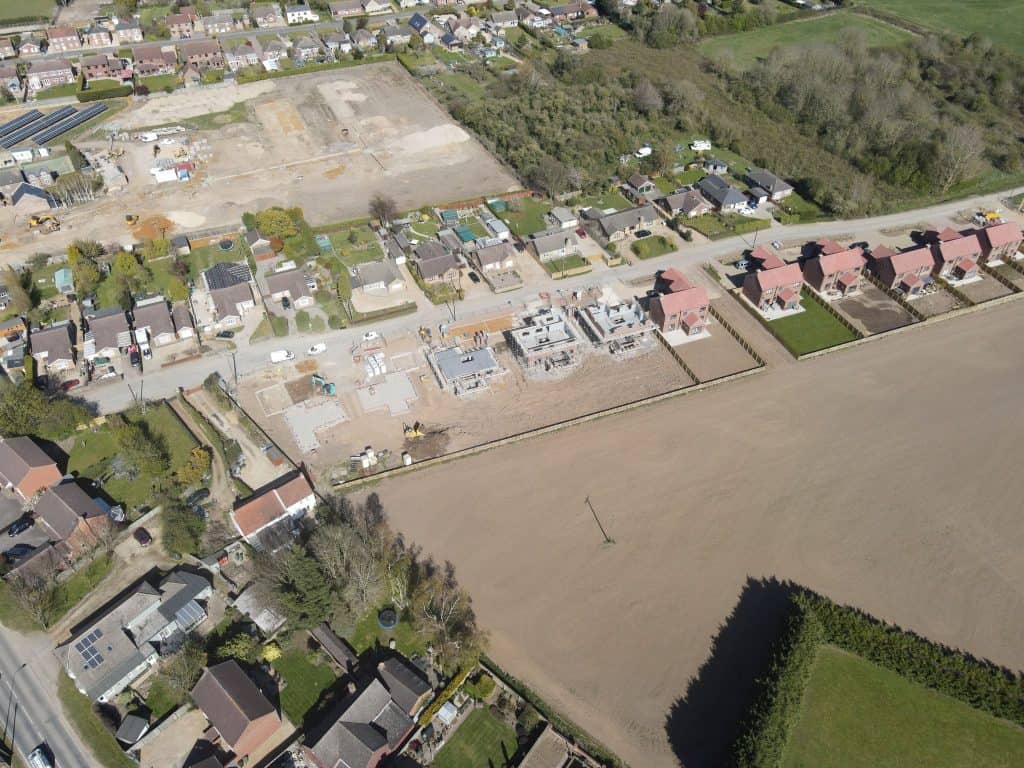 new homes being built with renewable energy solutions by double glazing funding scotland