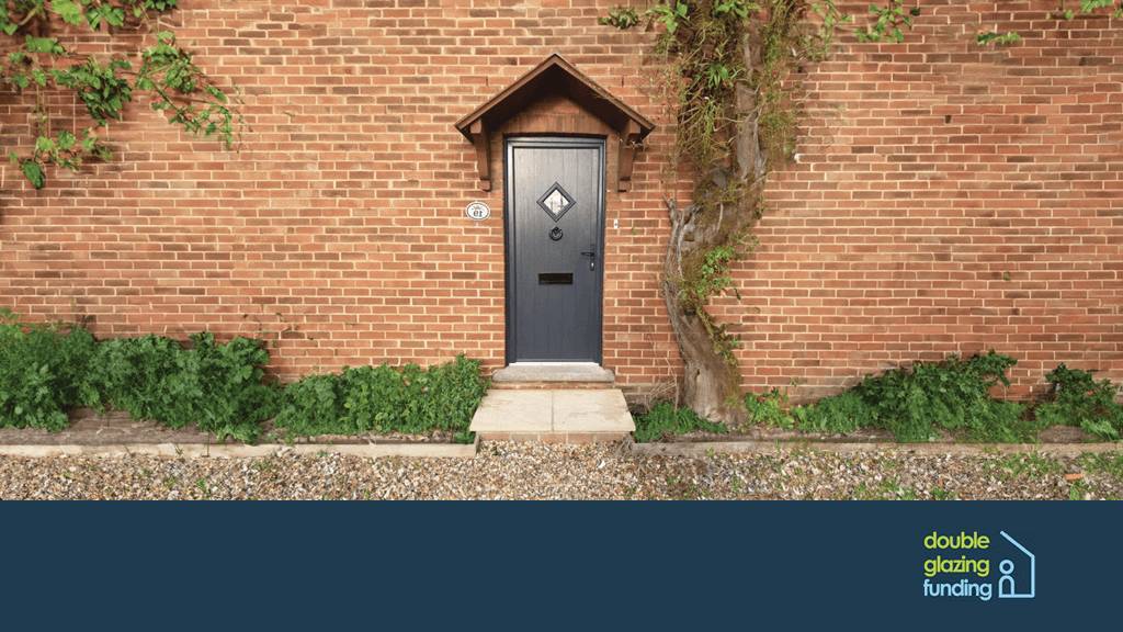 Black composite front door with wooden small porch