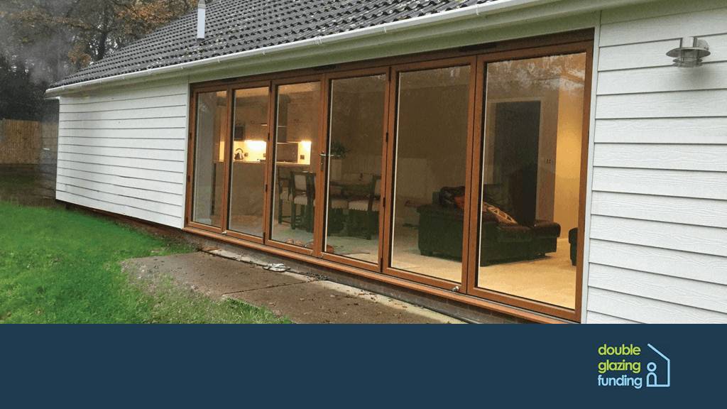 Large Golden Oak Bifold leading to garden
